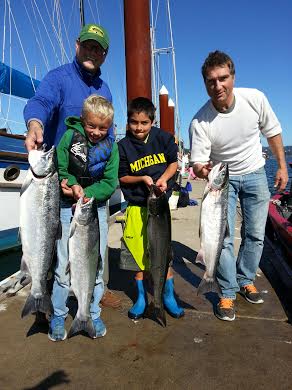 Family Catching Great Salmon in Oregon's Columbia River | Oregon Fishing Guide